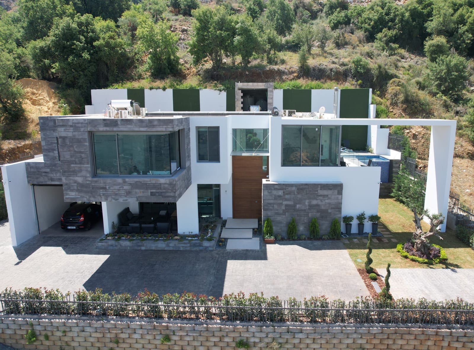 Private Residence, Mount Lebanon — Frameless glazing · Stone and aluminium